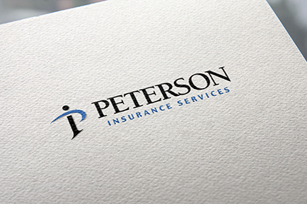Peterson Insurance Services logo printed on a paper